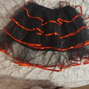 Black and red tulle skirt with red.ribbon
